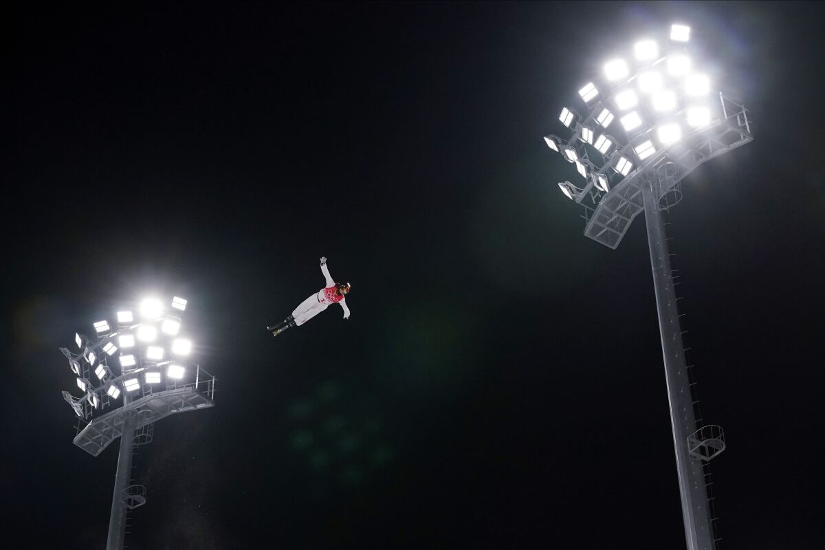 China's Xu Mengtao competes during the mixed team aerials finals at the 2022 Winter Olympics, Thursday, Feb. 10, 2022, in Zhangjiakou, China. (AP Photo/Gregory Bull)