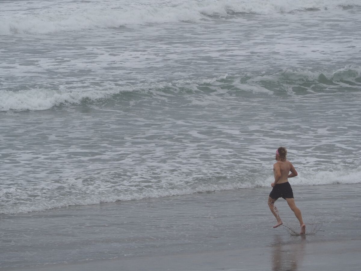 Brady Silverwood completed a 3,311-mile, seven-month run from New Jersey to Powerhouse Park when he ran into the Pacific Ocean.