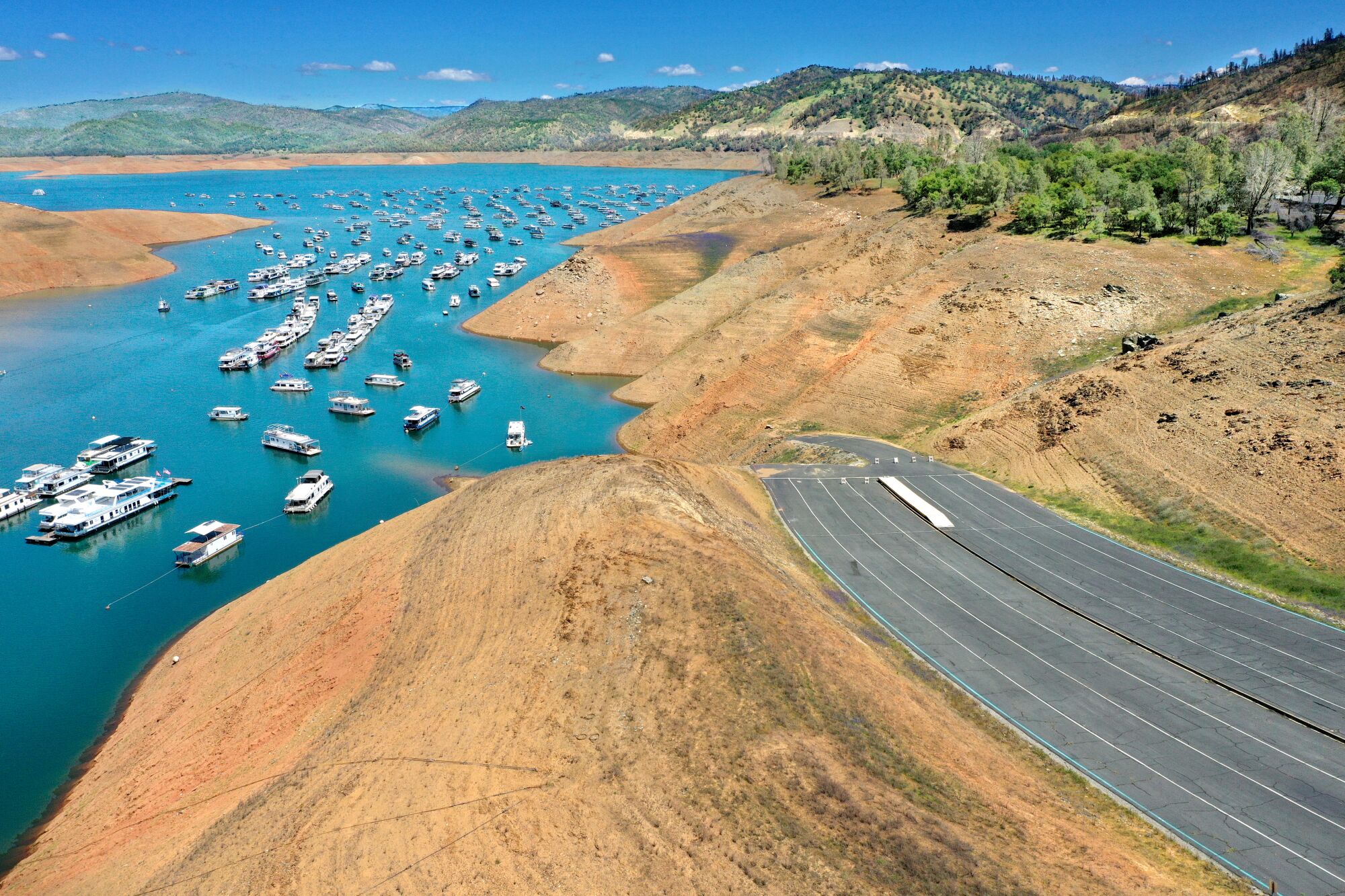 A boat ramp stops well above the Lake Oroville waterline.