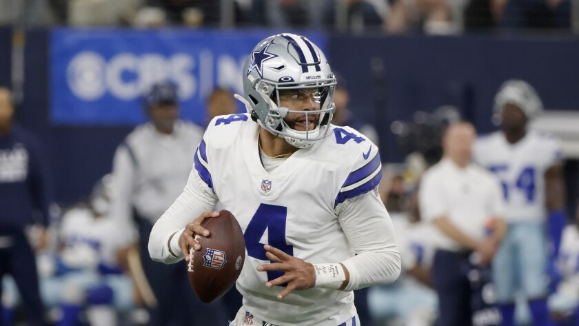 Dallas Cowboys quarterback Dak Prescott looks to pass against the Las Vegas Raiders.