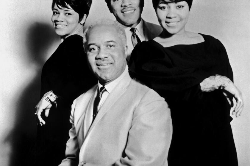 CIRCA 1965: Gospel group The Staple Singers, 1960s. (clockwise from top left): Mavis Staples, Pervis Staples, Cleotha Staples, and Roebuck 'Pops' Staples pose for a publicty shot circa 1965. (Photo by Michael Ochs Archives/Getty Images)