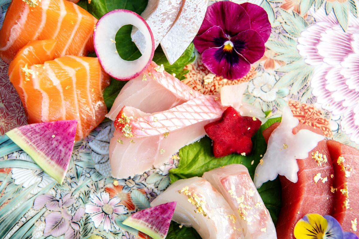 The ten-piece sashimi sampler from Chateau Hanare is sprinkled with gold leaf.
