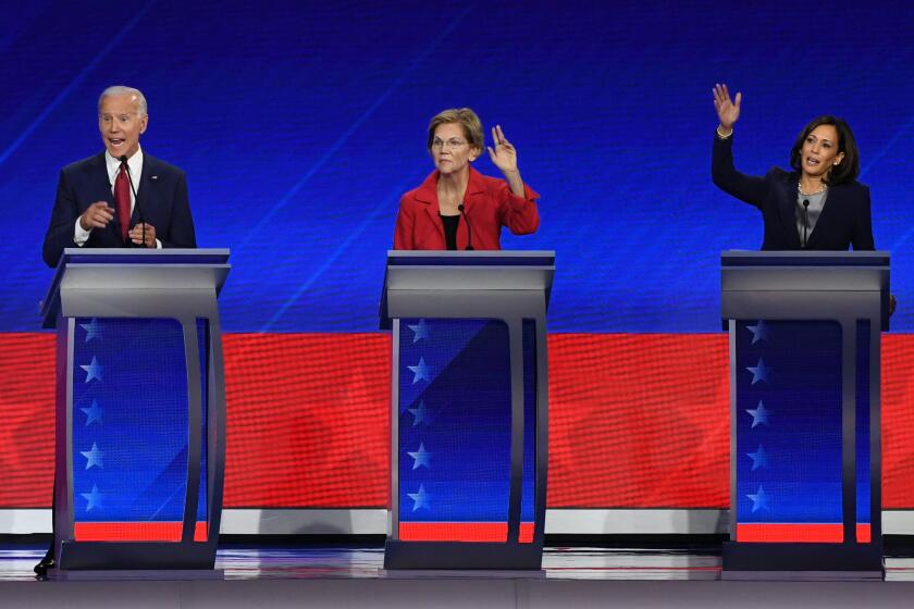 Democratic presidential hopefuls (fromL) Former Vice President Joe Biden, Massachusetts Senator Elizabeth Warren and California Senator Kamala Harris gesture during the third Democratic primary debate of the 2020 presidential campaign season hosted by ABC News in partnership with Univision at Texas Southern University in Houston, Texas on September 12, 2019. (Photo by Robyn BECK / AFP) (Photo credit should read ROBYN BECK/AFP/Getty Images)