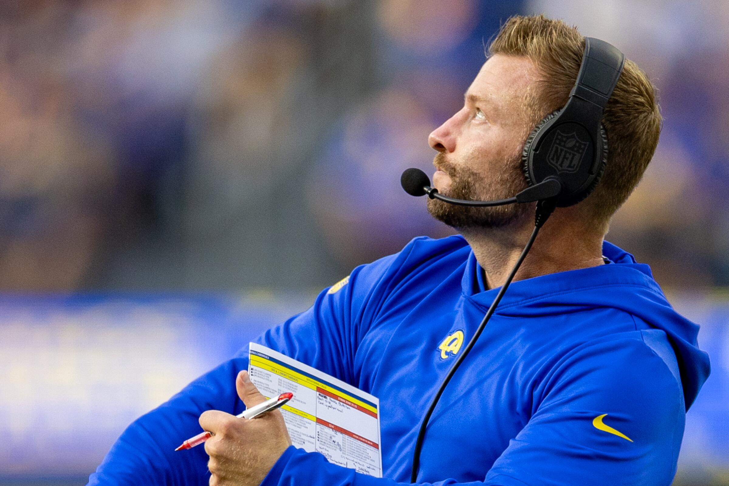 Rams coach Sean McVay celebrates a touchdown that had been under official review.