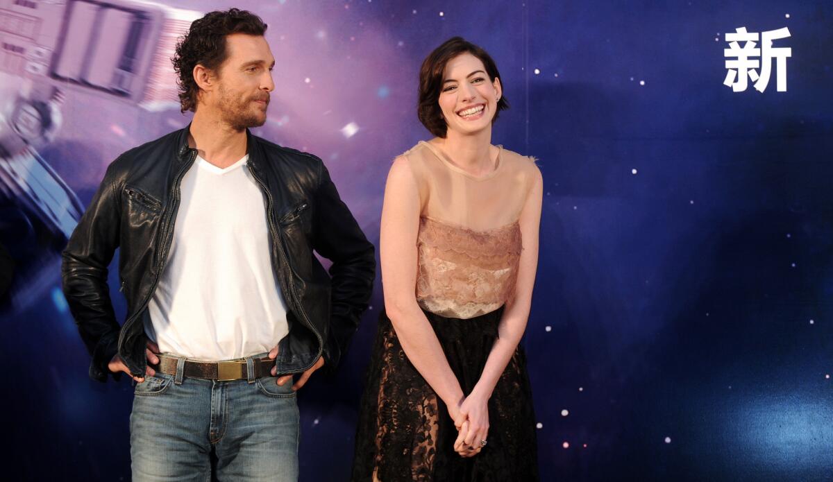 "Interstellar" stars Matthew McConaughey and Anne Hathaway attend a news conference for the film's Chinese premiere at the Peninsula Shanghai Hotel on Nov. 10.