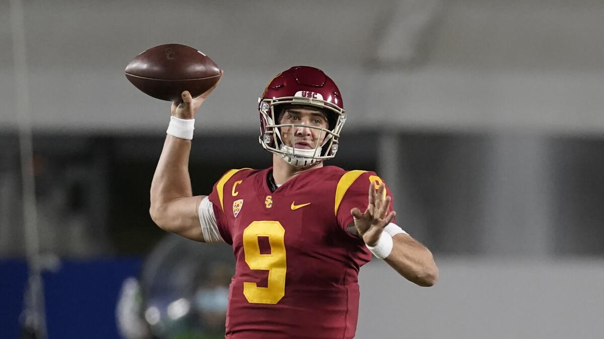 USC quarterback Kedon Slovis (9) throws a pass 