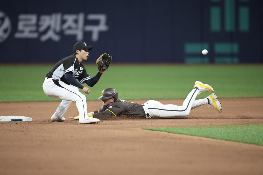San Diego Padres' Jackson Merrill steals second base in the seventh innings during the exhibition game between the Team Korea and San Diego Padres at the Gocheok Sky Dome in Seoul, South Korea, Sunday, March 17, 2024. The Los Angeles Dodgers and the San Diego Padres will meet in a two-game series on March 20th-21st in Seoul for the MLB World Tour Seoul Series. (AP Photo/Lee Jin-man)