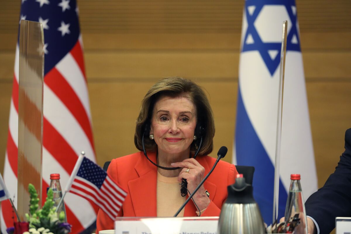 U.S. Speaker of the House of Representatives Nancy Pelosi, and House Intelligence Committee Chairman Adam Schiff, not seen, attend a joint meeting with speaker of the Knesset Mickey Levy at the Knesset, the Israeli Parliament, in Jerusalem, Israel, Wednesday, Feb. 16, 2022. Pelosi is on a two days official visit to Israel and the Palestinians Authority. (Abir Sultan/Pool Photo via AP)