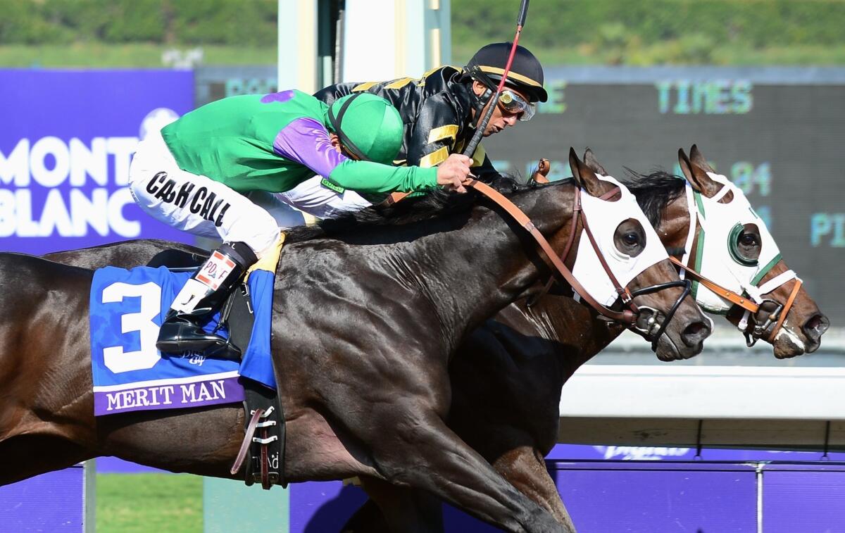 Jockey Rajiv Maragh guides Hightail to a victory by a nose over Merit Man and jockey Patrick Valenzuela in the Breeders' Cup Juvenile Sprint on Friday at Santa Anita Park.