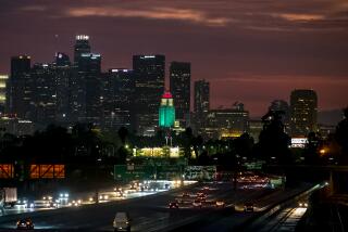 LOS ANGELES, CA - AUGUST 4, 2022: City Hall is lit up Wednesday night, Aug. 4 in Los Angeles, California.
