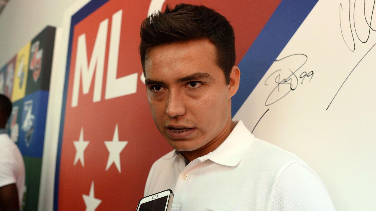 Chivas USA forward Erick Torres speaks to reporters during the unveiling of Major League Soccer's new logo in New York on Sept. 18.