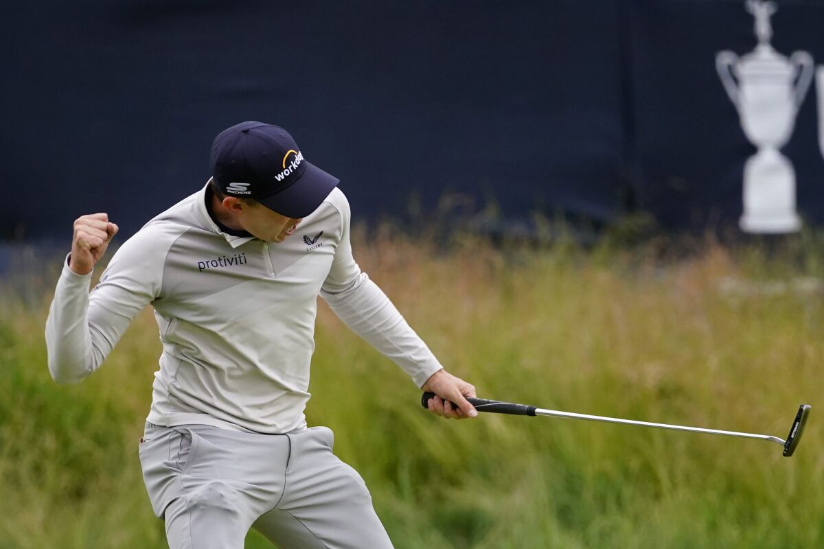 Matthew Fitzpatrick, of England, reacts after a putt on the 13th hole during the final round of the U.S. Open golf tournament at The Country Club, Sunday, June 19, 2022, in Brookline, Mass. (AP Photo/Julio Cortez)