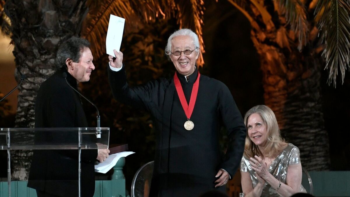 Arata Isozaki, center, after being presented the 2019 Pritzker Prize at Versailles.