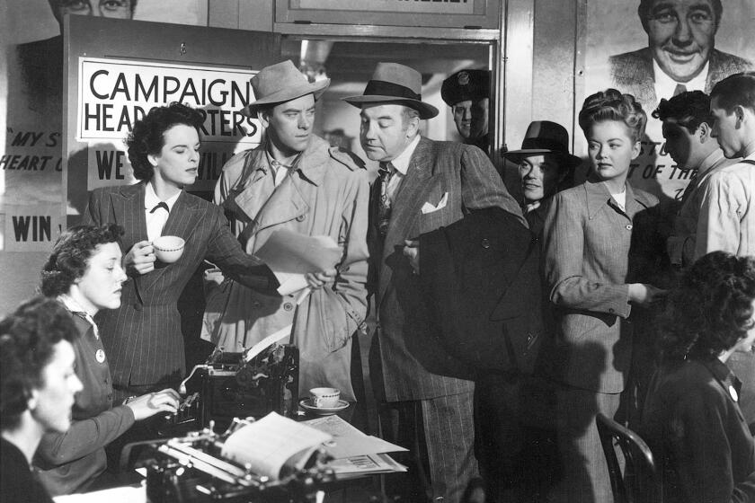 MERCEDES McCAMBRIDGE (center left) and JOHN IRELAND keep the campaign fires burning for BRODERICK CRAWFORD (center right) in the movie ALL THE KING'S MEN. It won an Academy Award for Best Picture in 1949. courtesy COLUMBIA PICTURES
