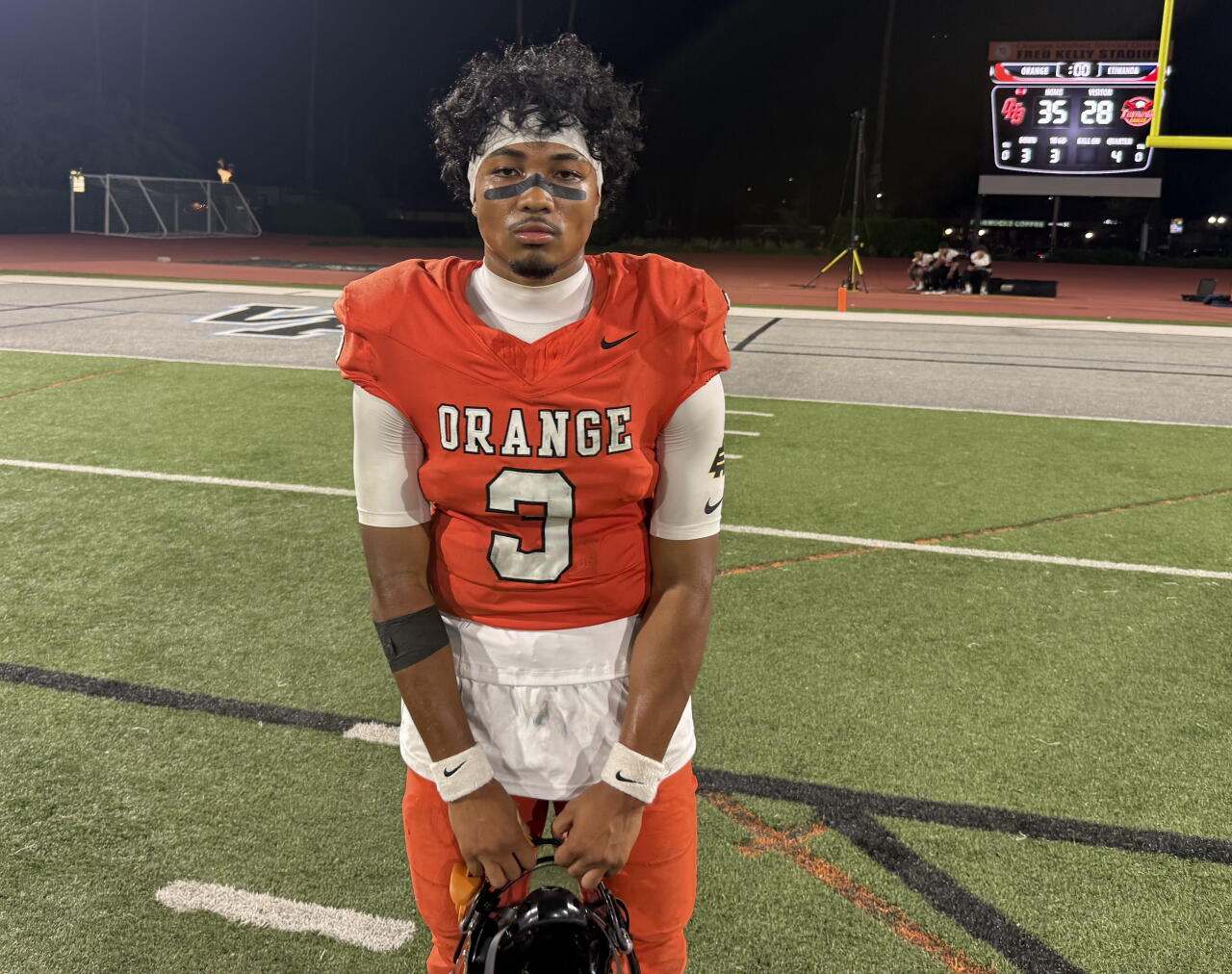 Orange High quarterback Star Thomas III poses for a photo after a win over Etiwanda on Sept. 18.