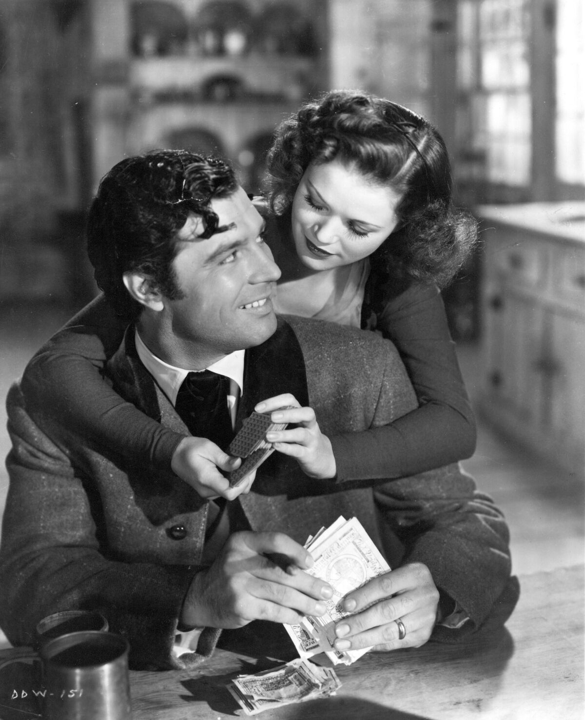 James Craig, left, and Simone Simon in 1941's "All That Money Can Buy" directed by William Dieterle.