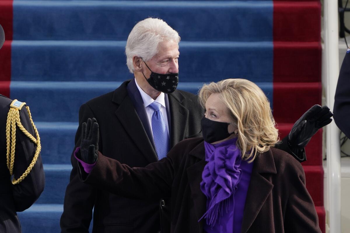 Former Secretary of State Hillary Clinton and former President Clinton 