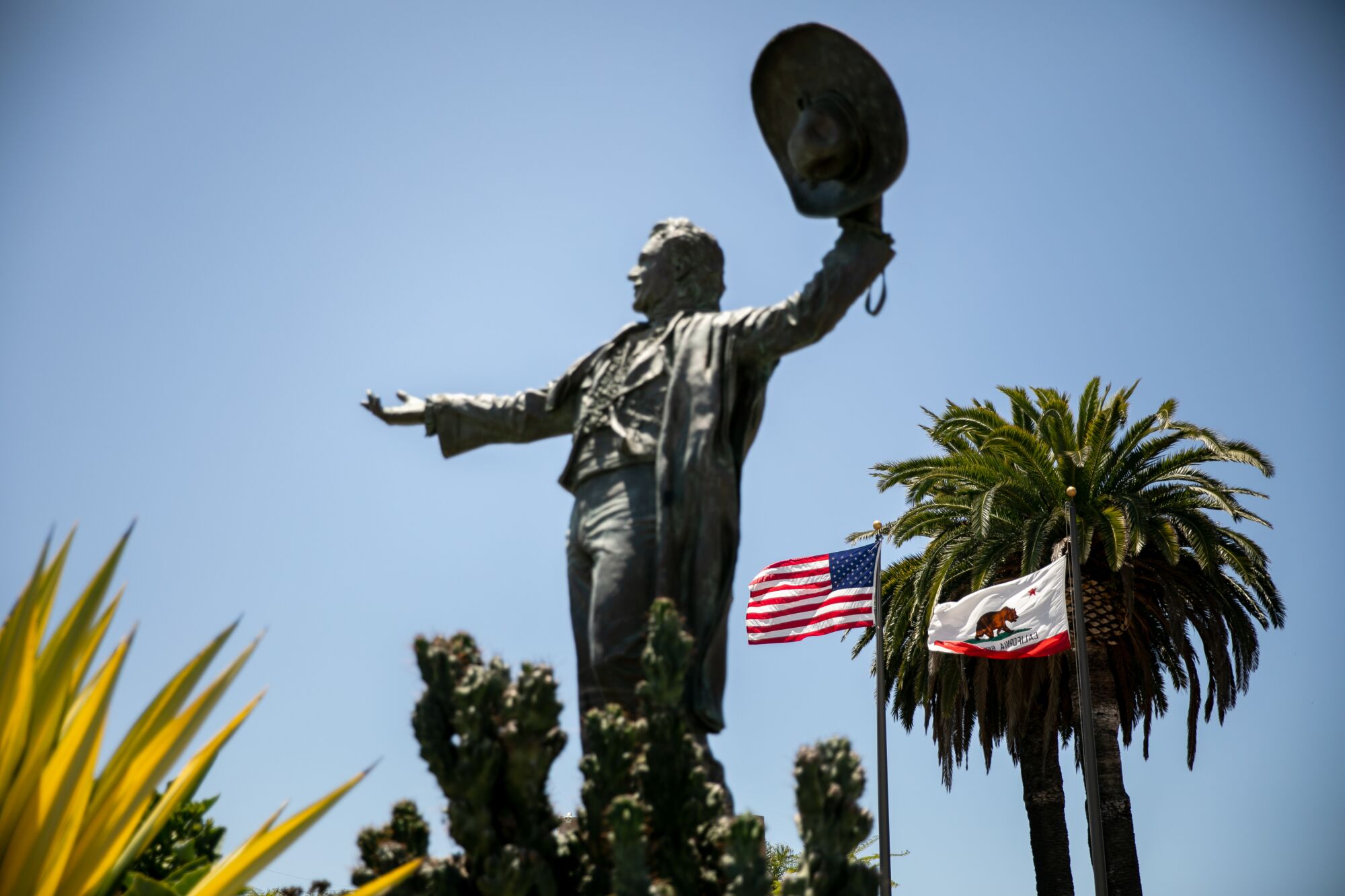 A statue of Don Diego, the late fair ambassador, stands at the gate to the Del Mar Fairgrounds on Wednesday. Fairgrounds officials are asking people to support a request for $20 million in federal aid to help them weather the financial blow they've taken during the pandemic.