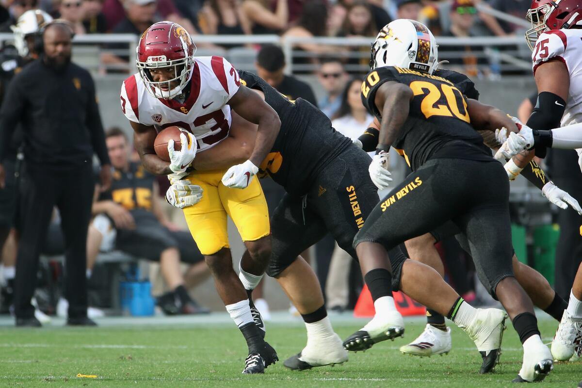 USC running back Kenan Christon carries the ball during the Trojans' win over Arizona State on Saturday.