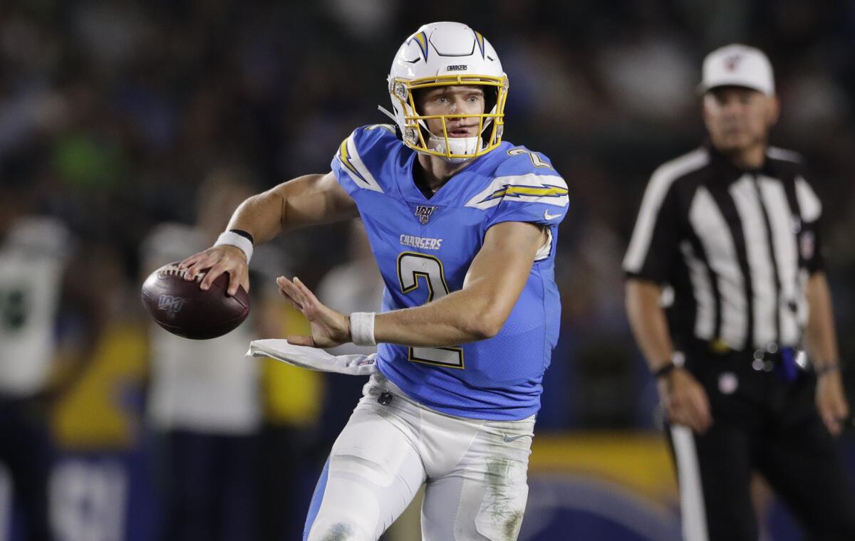 Chargers quarterback Easton Stick throws during a preseason game against the Seattle Seahawks on Aug. 24.