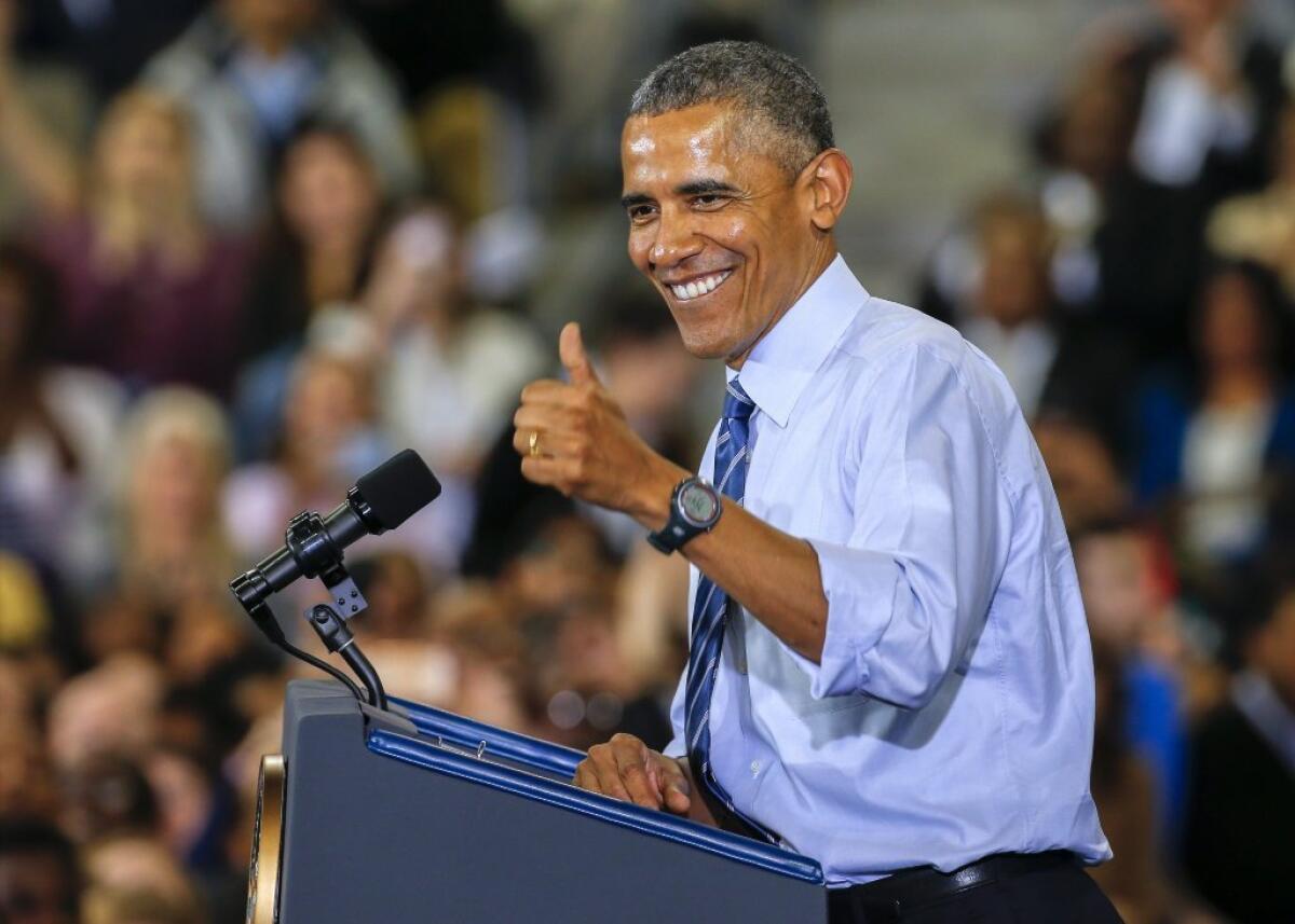 President Obama gestures to students and staff inside the McCamish Pavilion at the Georgia Institute of Technology in Atlanta on Tuesday. The Obama administration wants to create a "Student Aid Bill of Rights."