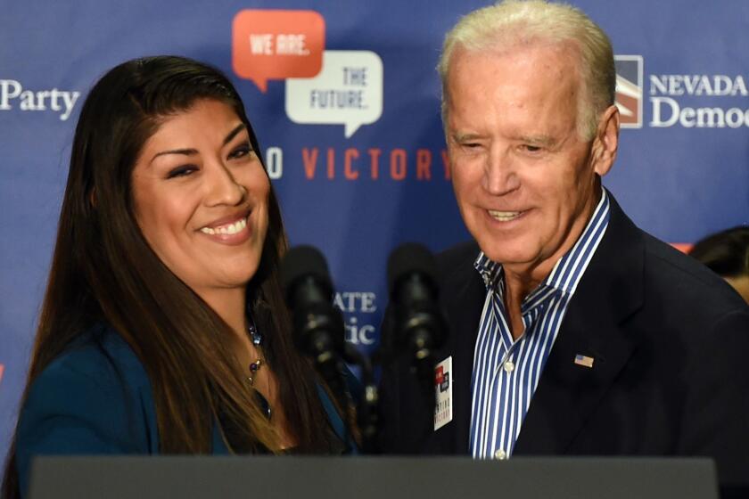 LAS VEGAS, NV - NOVEMBER 01: Democratic candidate for lieutenant governor and current Nevada Assemblywoman Lucy Flores (D-Las Vegas) (L) introduces U.S. Vice President Joe Biden at a get-out-the-vote rally at a union hall on November 1, 2014 in Las Vegas, Nevada. Biden is stumping for Nevada Democrats ahead of the November 4th election. (Photo by Ethan Miller/Getty Images) ** OUTS - ELSENT, FPG, CM - OUTS * NM, PH, VA if sourced by CT, LA or MoD **
