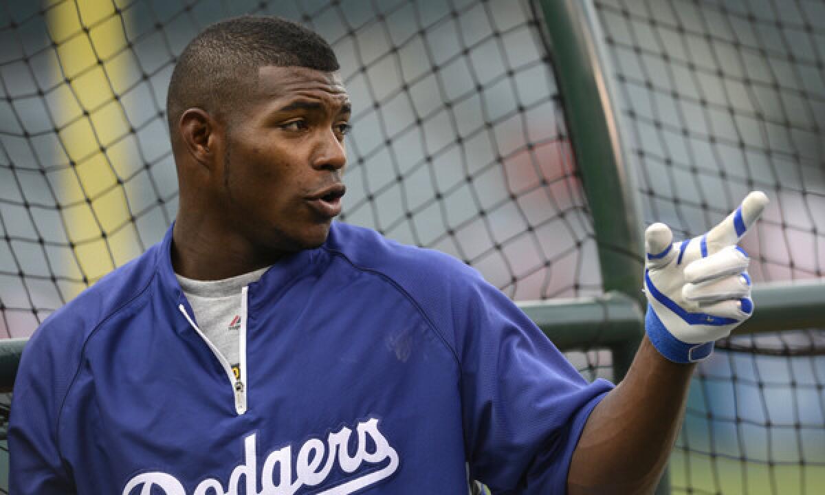 Dodgers right fielder Yasiel Puig was benched by Manager Don Mattingly for Friday's home opener against the San Francisco Giants.