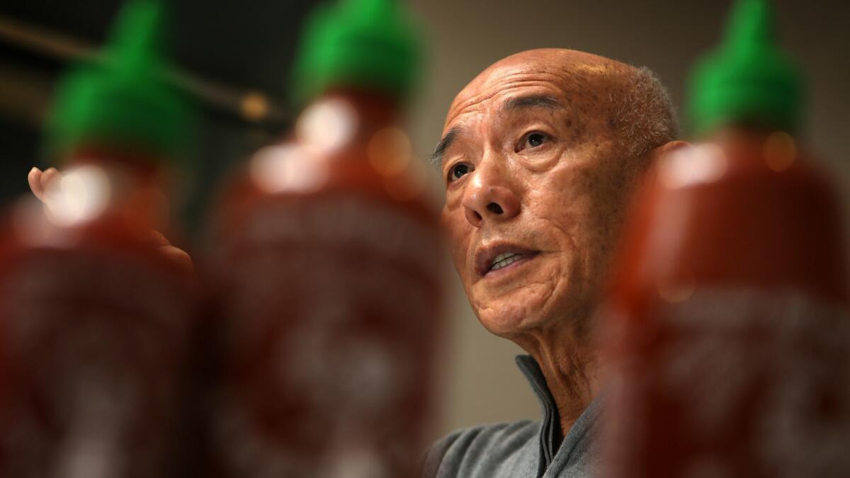 David Tran, shown in 2015, is the owner of Huy Fong Foods Inc., which produces the popular Sriracha sauce in a plastic bottle with a green top and rooster logo.