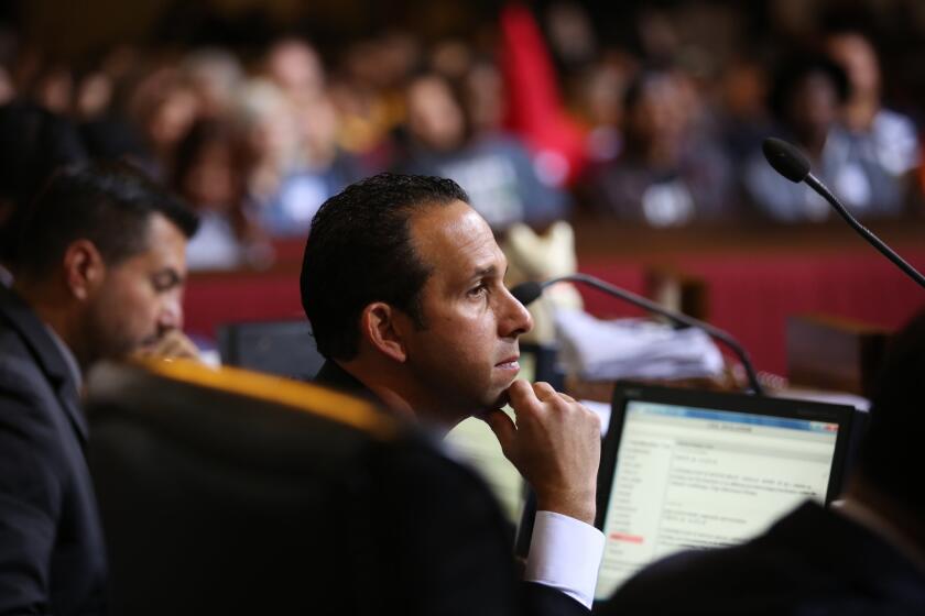 LOS ANGELES, CA JUNE 03, 2015 -- Los Angeles City Councilmember Mitch Englander listens as the council moved to the forefront of a national campaign to boost the incomes of low-wage workers on June 3, 2015. The Los Angeles lawmakers voted to approve an ordinance hiking the citywide minimum wage to at least $15 an hour by 2020. L.A. is slated to become the largest city in the nation mandating higher wages. The vote was 13 to 1, with Councilman Mitch Englander casting the sole vote in opposition. (Al Seib / Los Angeles Times)