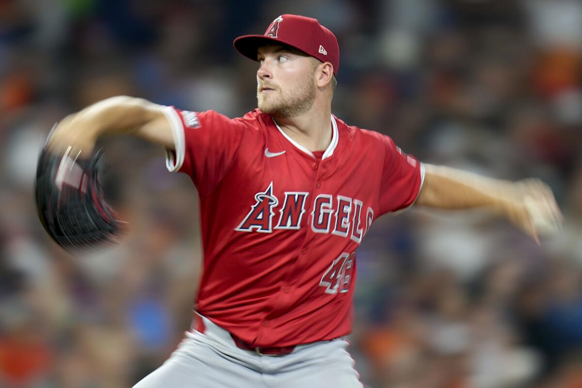 Angels starting pitcher Reid Detmers delivers during the second inning of a loss to the Houston Astros.