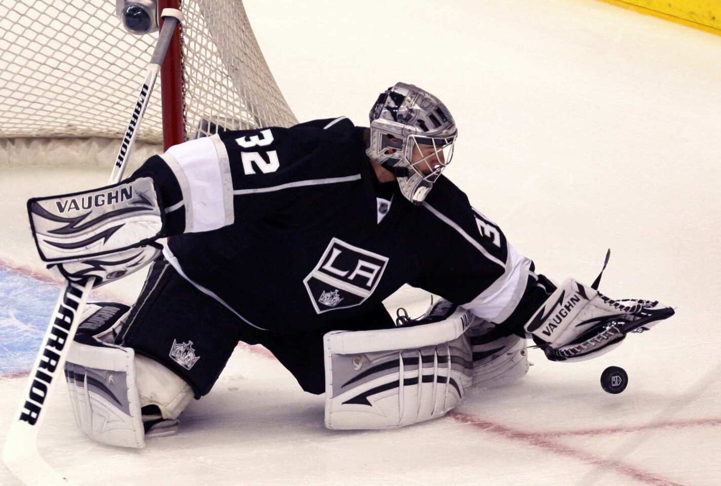Kings goalie Jonathan Quick makes a save during the first period of Thursday's playoff game against the St. Louis Blues.