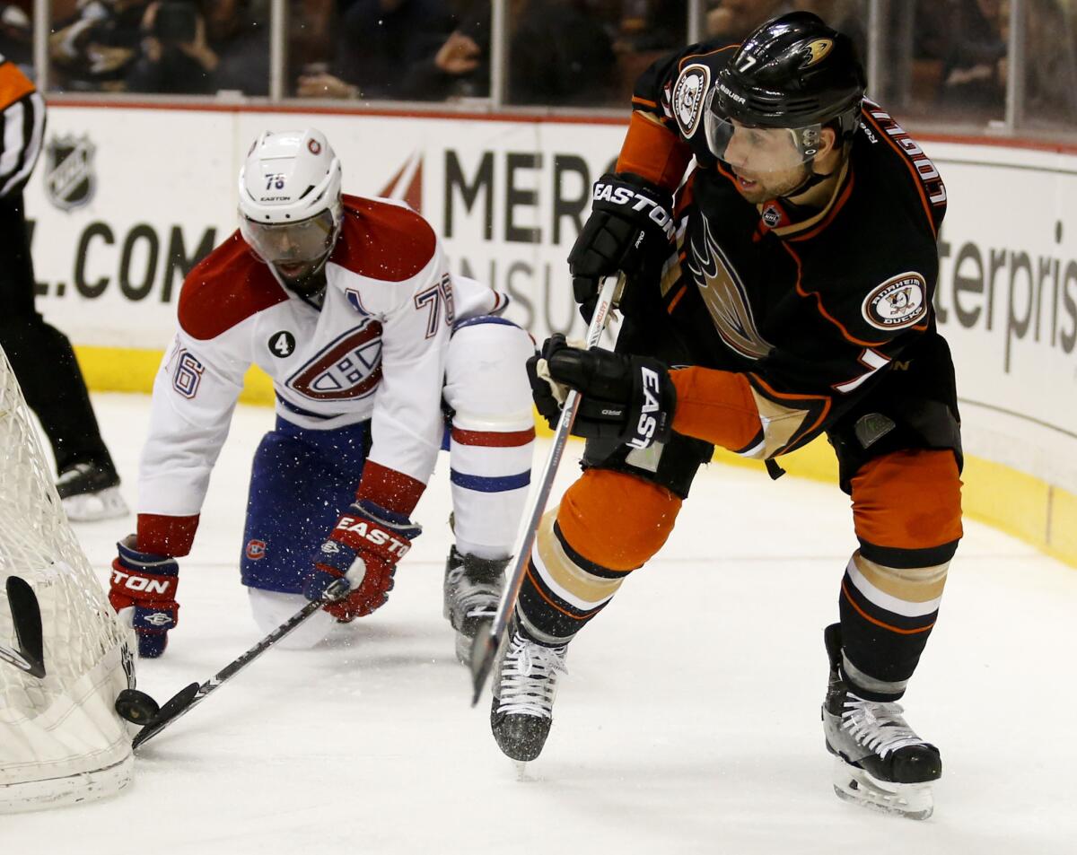 Montreal defenseman P.K. Subban and Ducks center Andrew Cogliano battle for the puck behind the net during the second period. The Ducks beat the Canadiens, 3-1.