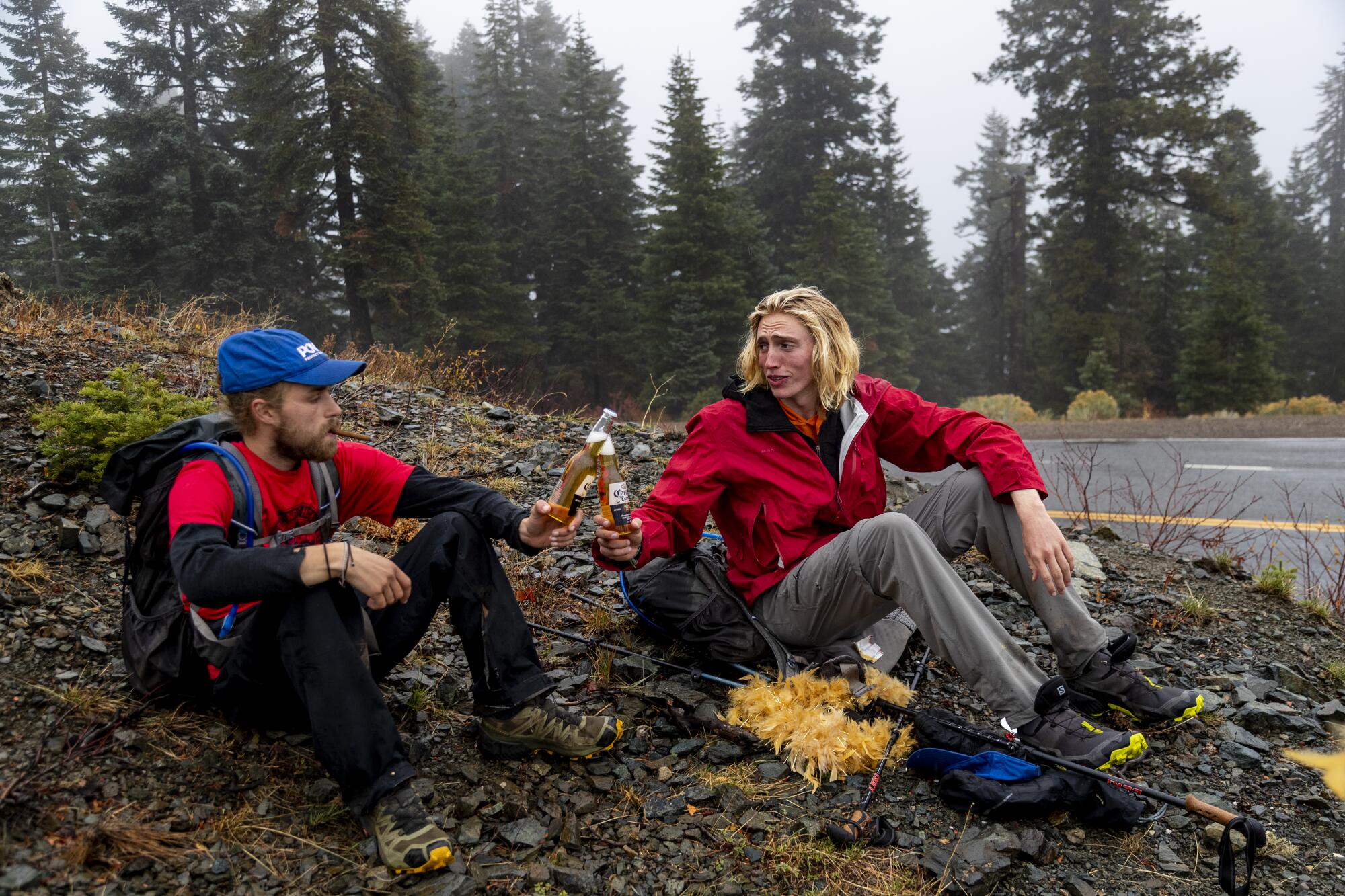 Potter, left, and  Parell toast with beer