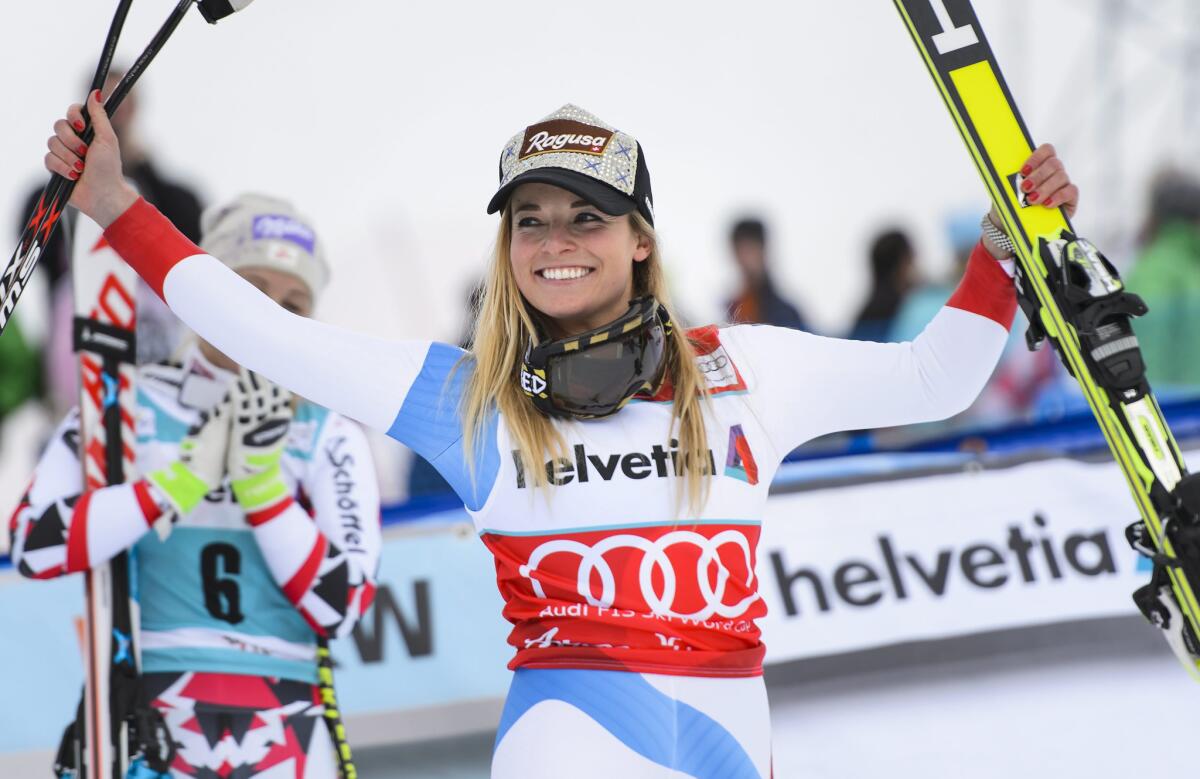 Lara Gut celebrates during the podium ceremony of the Super-G run of the Women's Super Combined race at the FIS Alpine Ski World Cup.