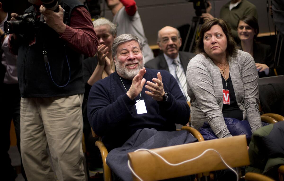 Apple co-founder Steve Wozniak and his wife Janet Hill at Federal Communications Commission's open hearing on "net neutrality" Thursday.