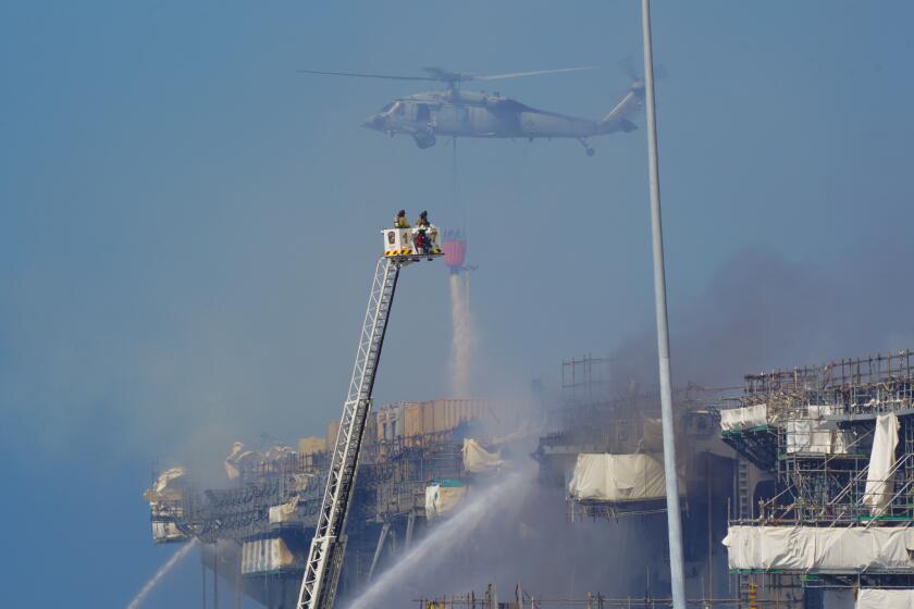 Inferno on San Diego Navy ship rages into second day