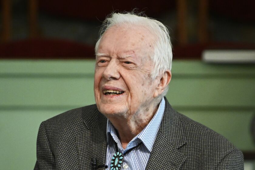 FILE - In this Nov. 3, 2019, file photo, former President Jimmy Carter teaches Sunday school at Maranatha Baptist Church in Plains, Ga. Carter marks his 96th birthday Thursday, Oct. 1., the latest milestone for the longest-lived of the 44 men to hold the highest American office. Carter planned to celebrate at his home in Plains, Ga., with his wife of 74 years, Rosalynn Carter, according to a spokeswoman for the Carter Center in Atlanta. (AP Photo/John Amis, File)