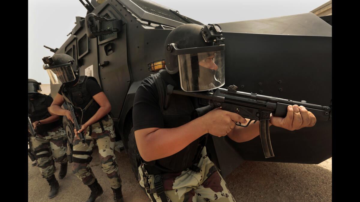 Members of a SWAT team in Riyadh practice tactical maneuvers in preparation for possible terrorist attacks.