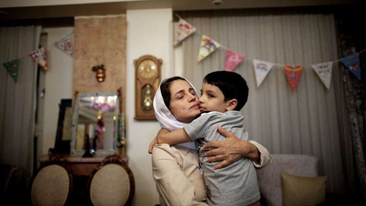 Iranian lawyer Nasrin Sotoudeh embraces her son Nima upon her release from prison in September 2013 after serving a three-year sentence for “spreading propaganda against the system.”