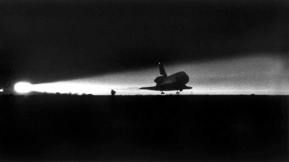 Jan. 18, 1986: A spotlight captures the landing of the shuttle Columbia at Edwards Air Force Base in the Mojave Desert.