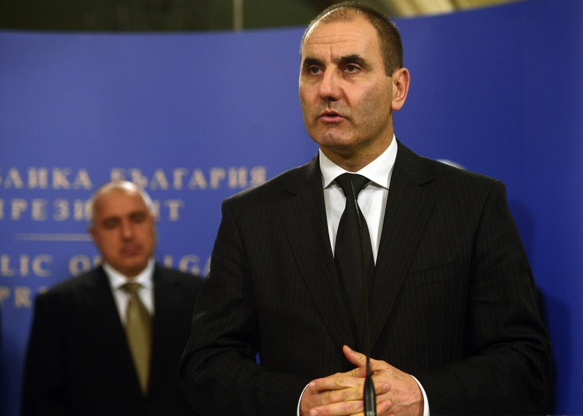 Bulgarian Interior Minister Tsvetan Tsvetanov, right, speaks during a news conference after a national security conference in Sofia.