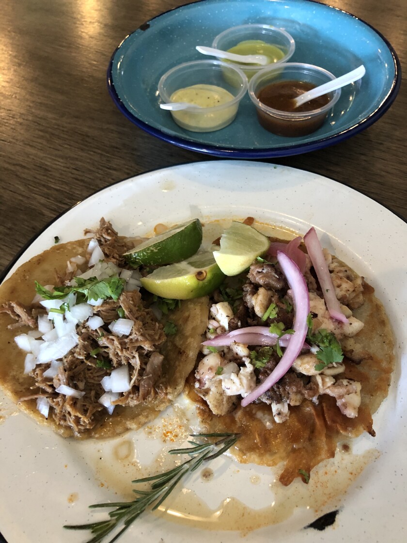 Tacos at El Cruce + 241 in Chula Vista are served with three housemade salsas.