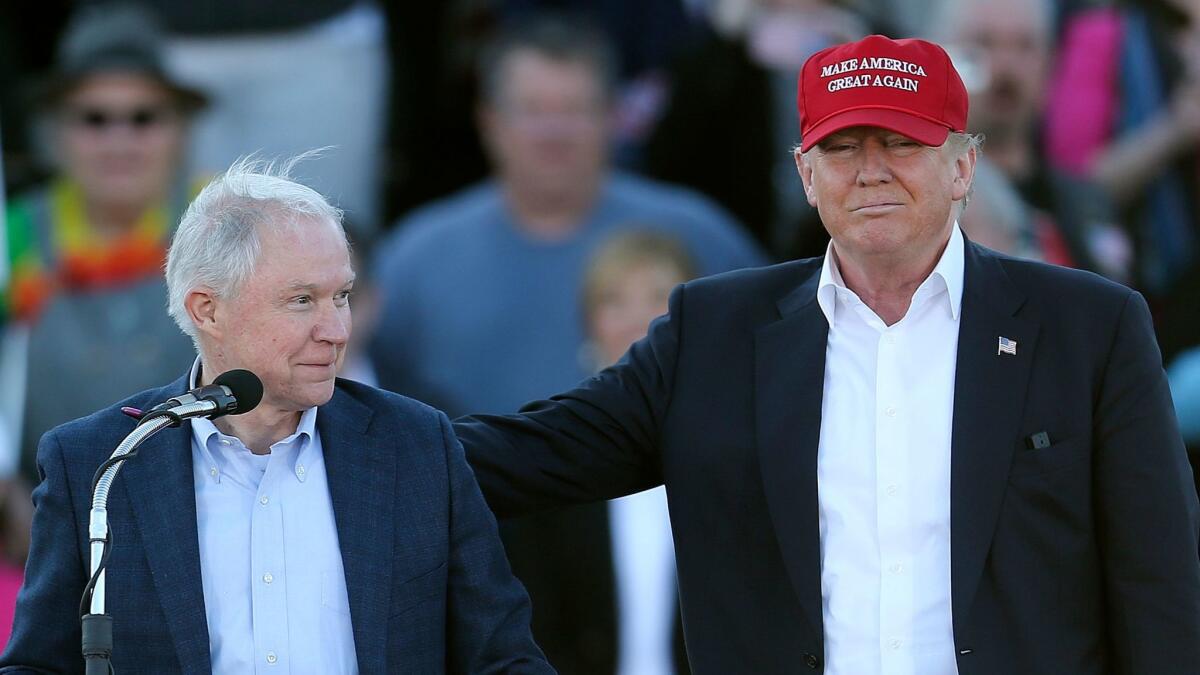 President Trump with then-Sen. Jeff Sessions at a February 2016 campaign rally for Trump in Madison, Ala.