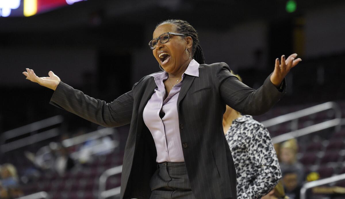 USC Coach Cynthia Cooper-Dyke yells to her team during the first half of a game against Santa Clara.