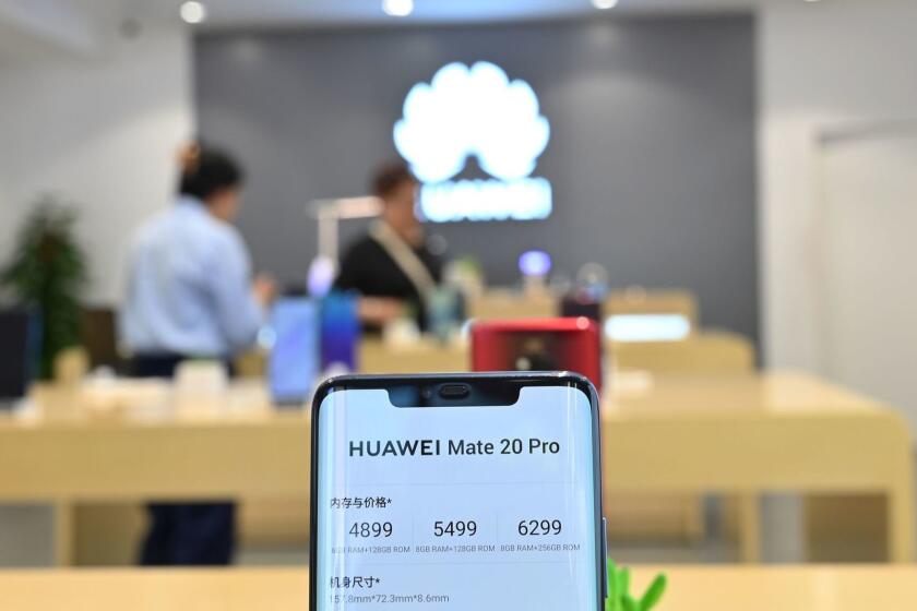 A Huawei smartphone is seen in a Huawei store in Shanghai on May 24, 2019. (Photo by HECTOR RETAMAL / AFP)HECTOR RETAMAL/AFP/Getty Images ** OUTS - ELSENT, FPG, CM - OUTS * NM, PH, VA if sourced by CT, LA or MoD **