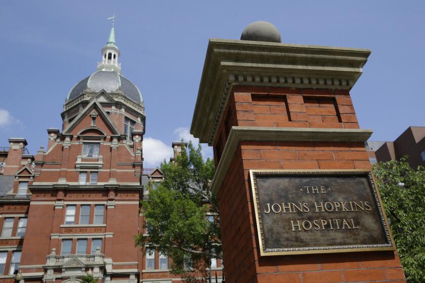 A gynecologist at Johns Hopkins Hospital in Baltimore secretly photographed patients, a class-action suit alleges.
