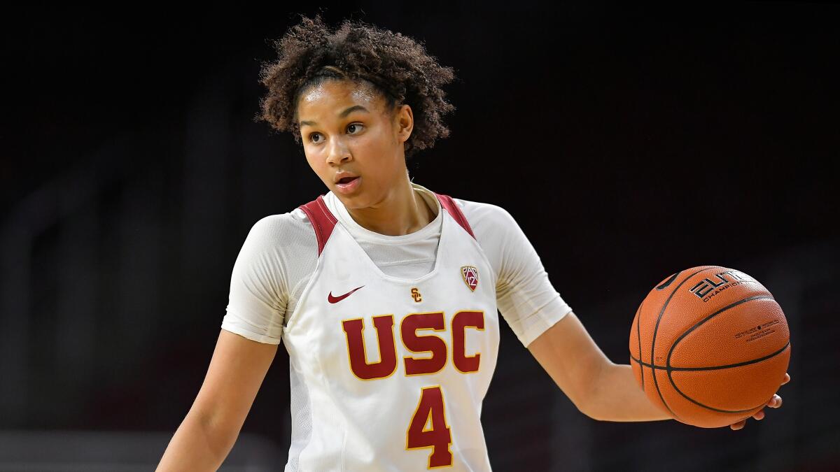 USC guard Endyia Rogers brings the ball up the court.