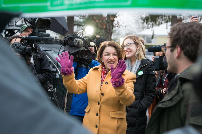 MANCHESTER, NH - FEBRUARY 11: Democratic presidential candidate Sen. Amy Klobuchar (D-MN) waves to supporters while visiting the polling location at Webster Elementary School during the primary election on February 11, 2020 in Manchester, New Hampshire. (Photo by Scott Eisen/Getty Images) ** OUTS - ELSENT, FPG, CM - OUTS * NM, PH, VA if sourced by CT, LA or MoD **
