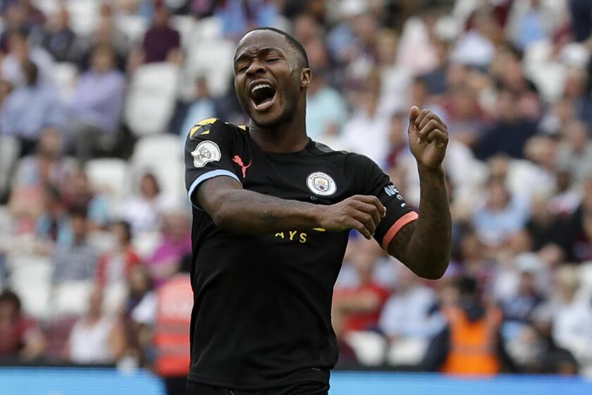 Manchester City's Raheem Sterling celebrates after scoring his side's fifth goal during the English Premier League soccer match between West Ham United and Manchester City at London stadium in London, Saturday, Aug. 10, 2019. (AP Photo/Kirsty Wigglesworth)