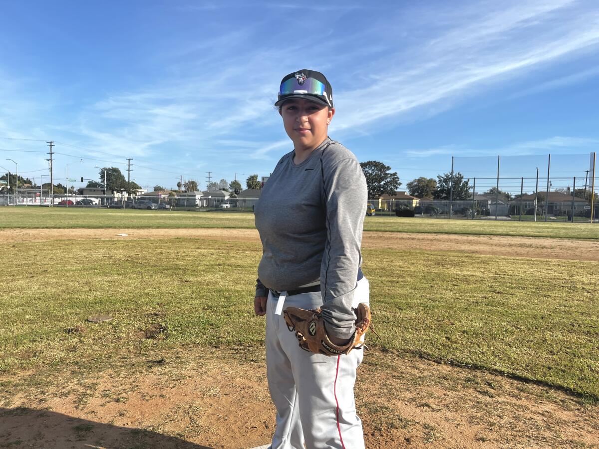 Washington Prep freshman pitcher Emily Varela poses for a photo on the mound.